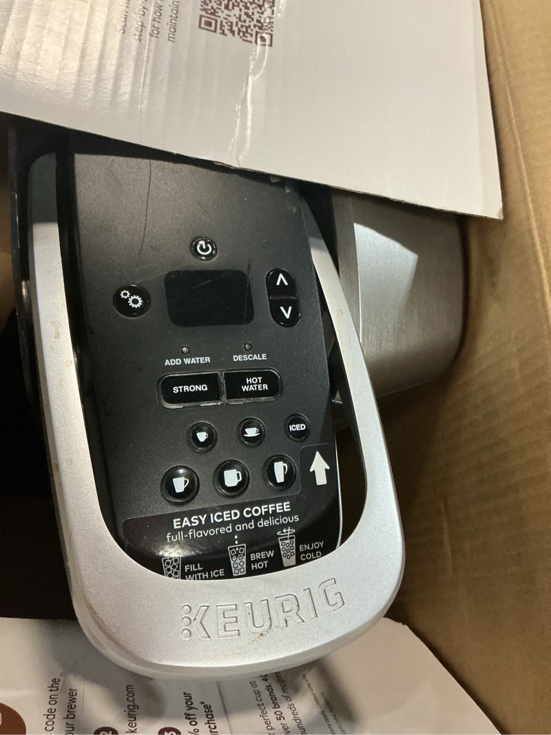 Condition photo showing As Is for keurig k-elite single serve k-cup pod coffee maker, with strength and temperature control, iced coffee capability, 8 to 12oz brew size, programmable, brushed silver