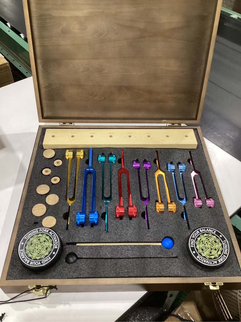 Condition photo showing Good Condition for Chakra Tuning Fork Set with 8 Weighted Forks – 126.22Hz, 136.1Hz, 141.27Hz, 172.06Hz, 194.18Hz, 210.42Hz, 221.23Hz, 272.2Hz – Includes Wooden Bases, Glass Bases, Activators & Storage Case