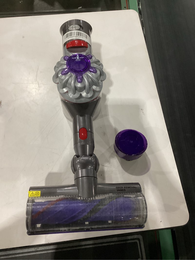 Condition photo showing As Is for dyson v8 plus cordless vacuum, cleans hard floors and carpets, detangles, converts to handheld, 115aw, 2 power modes, up to 40 minutes¹