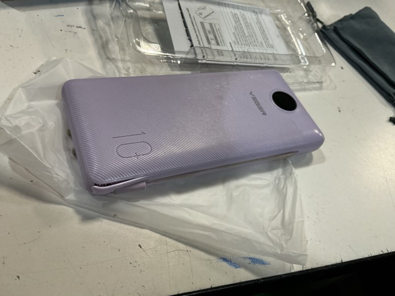 Condition photo showing As Is for veger portable charger with built-in ac plug and cables, all in one 10000mah ultra slim power bank travel essentials, fast charging battery pack compatible with iphone, samsung, android (purple) e purple