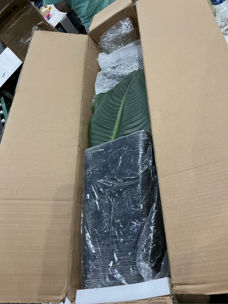 Condition photo showing Good Condition for lifelike bird of paradise artificial plant 5ft faux banana leaf tree with black tall wavy-textured planter for home decor - perfect indoor silk floor plant for living room office ambiance enhancement black wavy-textured planter 5ft