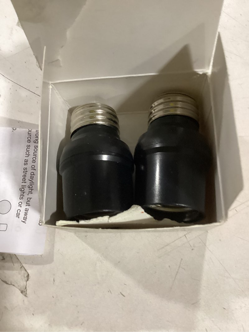 Condition photo showing As Is for suraielec light sensor socket, automatic dusk to dawn light socket with 360° sensor rotation, e26 e27 bulb base adapter for outdoor lighting, ul listed, black, 2 pack
