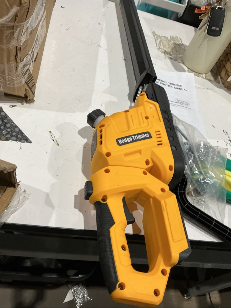 Condition photo showing As Is for cordless hedge trimmer compatible with dewalt 20v battery (no battery)