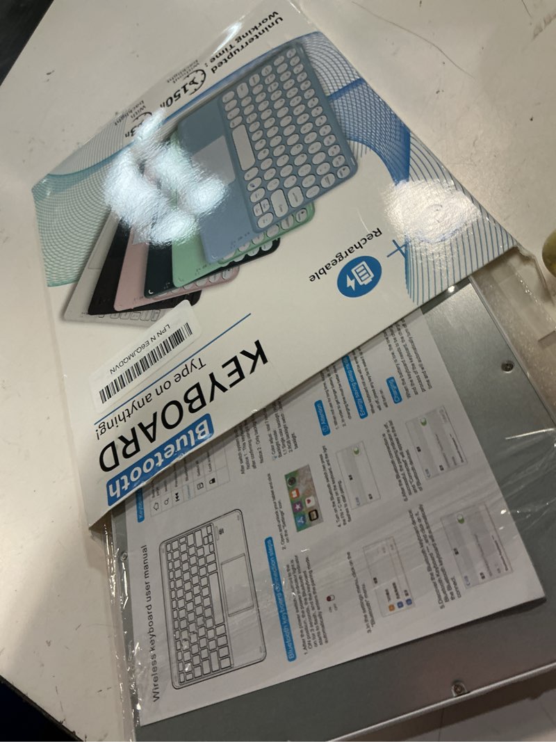 Condition photo showing Good Condition for wireless bluetooth keyboard,10 inch portable rechargeable keyboard with touchpad ultrathin bluetoothkeyboard for ios/android/windows tablet, computer and phone universal (white)