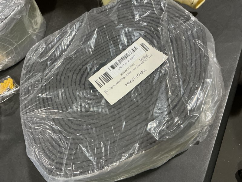 Condition photo showing Good Condition for Pipe Insulation Wrap Foam Tube Self Adhesive Heat Tape for Water Pipes, Outdoor Foam and Foil Water Pipe Insulation Wrap for Winter, Can Be Used for Self Regulating Pipe Heat Tape Foam and Foil 4" W x 33' L