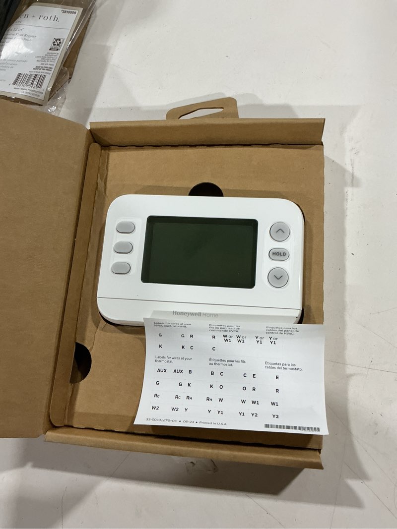 Condition photo showing As Is for honeywell home x2p single-stage 24-volt 5-2 day programmable thermostat