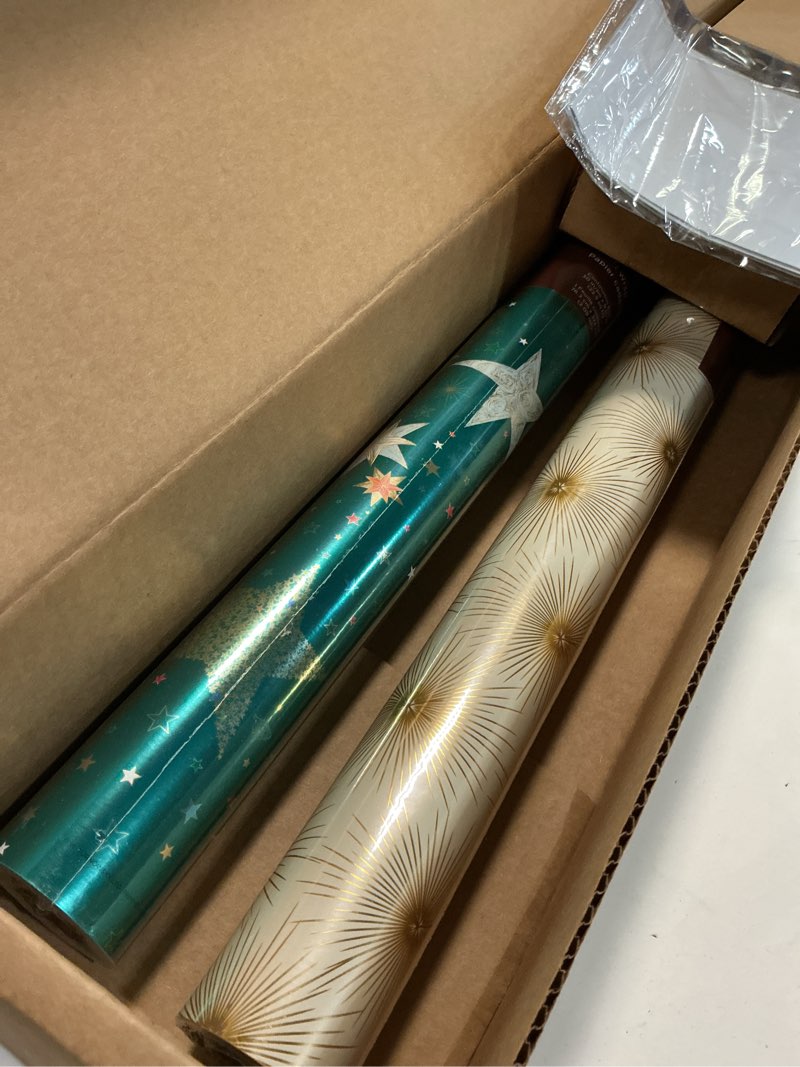 Condition photo showing Good Condition for papyrus christmas wrapping paper set, teal & gold stars, gold stars (2 rolls 45 sq. ft., 2 ribbons, 5 tags, 12 labels)