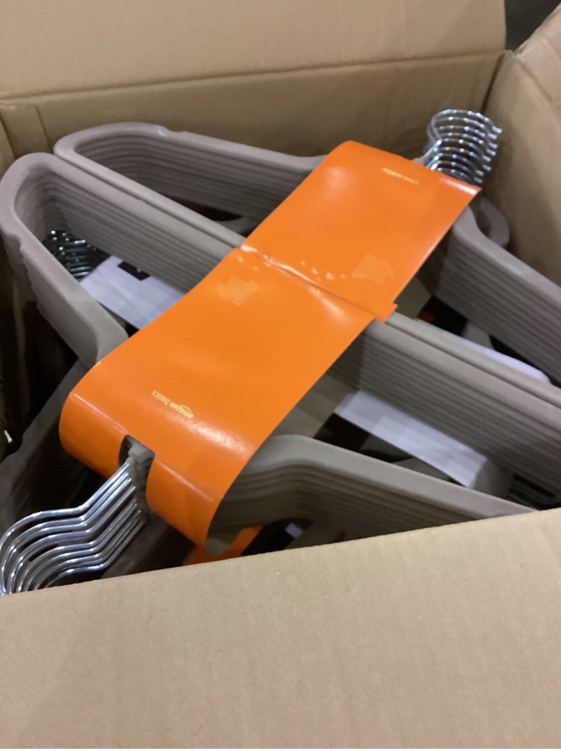 Condition photo showing Good Condition for Amazon Basics Slim, Velvet, Non-Slip, Durable Suit Clothes Hangers for Closet, Coats, Pants, Shirts, Gray/Silver, Pack of 100 Gray/Silver Pack of 100