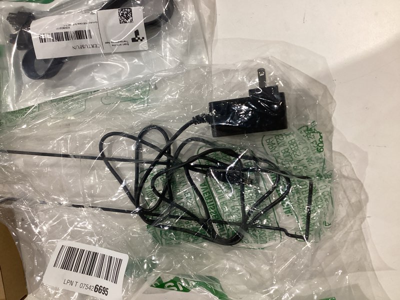 Condition photo showing Good Condition for assorted lot of electronics (headphones, small gadgets, headsets, etc.) 