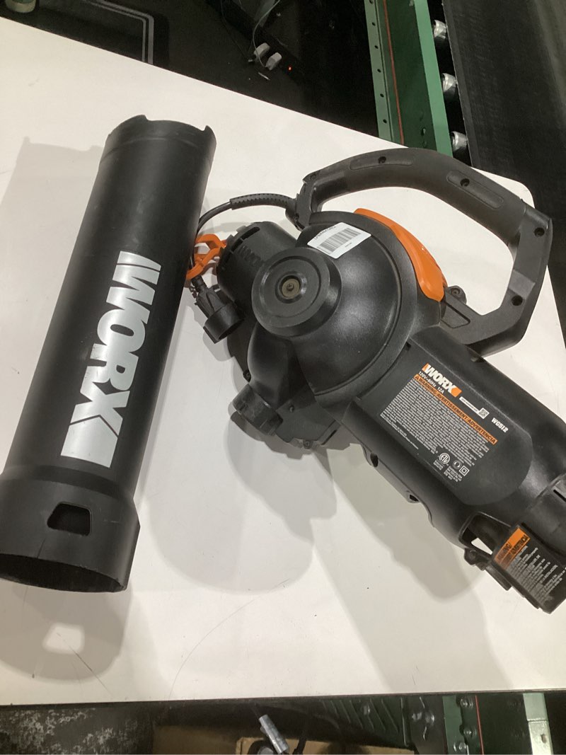 Condition photo showing As Is for (used, not tested, incomplete parts)worx 12 amp trivac 3-in-1 electric leaf blower/mulcher/yard vacuum - wg512
