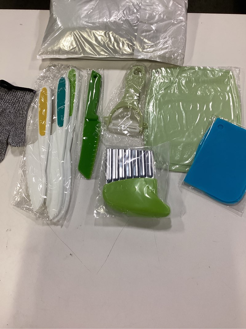 Condition photo showing Good Condition for 2 pack 11pcs kids kitchen knifes for real cooking toddler knife set include plastic kid safe knives dough cutter crinkle cutter  cutting board y peeler  cut 2 pack