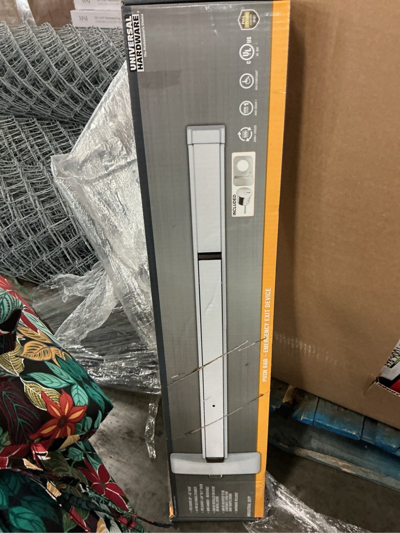 Condition photo showing New/Like New for commercial rim/panic exit device with 6-pin sc4 cylinder and pull trim - ansi grade 1, ul 305, ada, aluminum finish