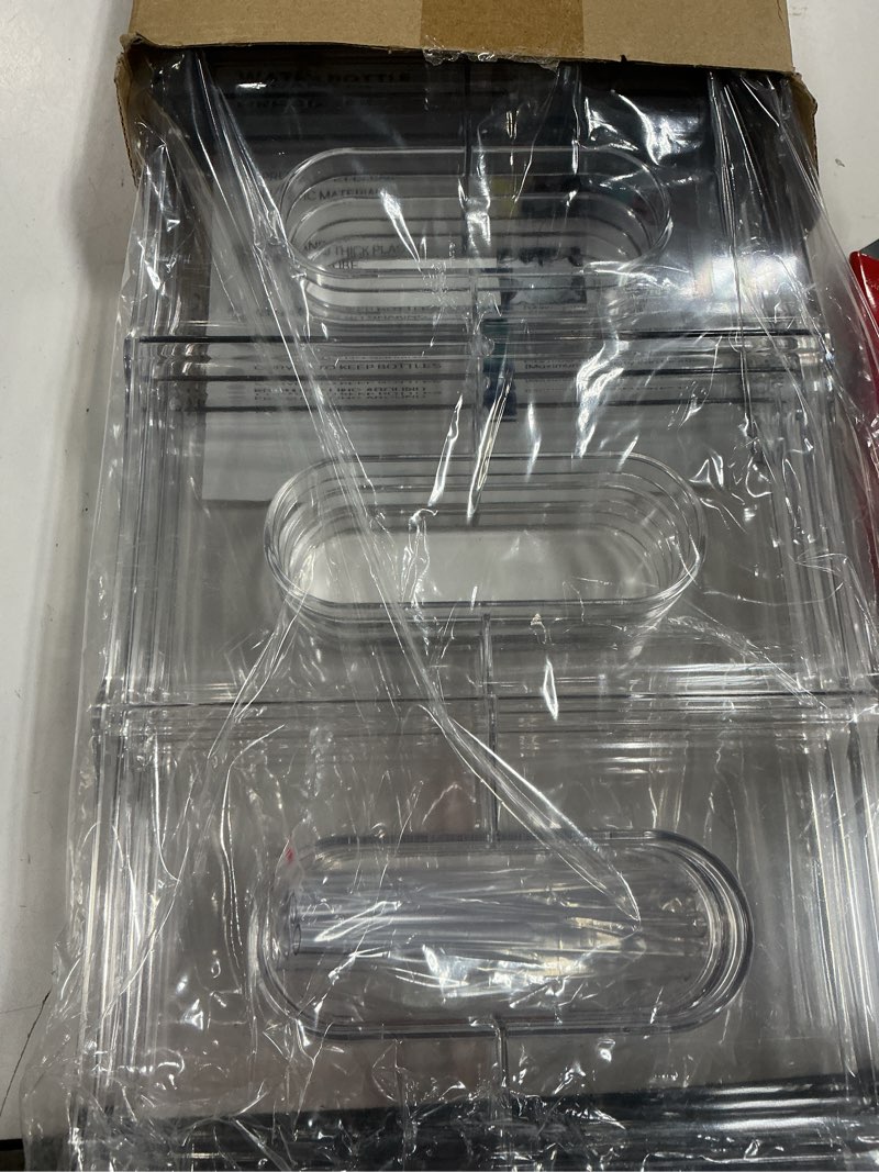 Condition photo showing Good Condition for LARGER Compartment - 3 Tier Stackable Water Bottle Organizer Holder - for Stanley 40oz & Others' Large Tumbler - Clear Wine Rack, 12 Cup Bottle Holder for Cabinet Home Countertop Fridge Pantry Shelf 3 Tier - Hold 12 Clear