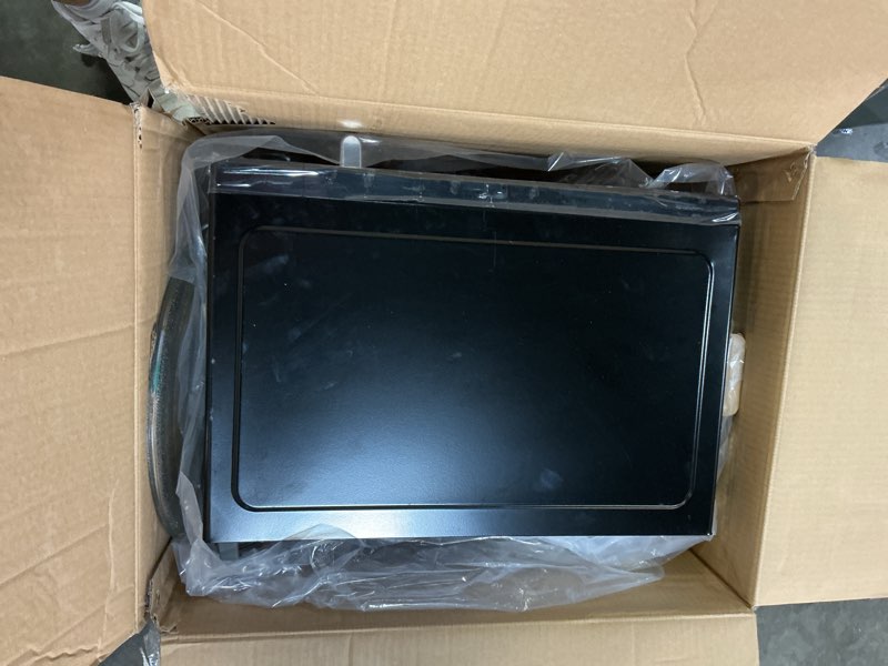 Condition photo showing As Is for hamiilton 1.1 cu ft countertop microwave oven in stainless steel, sensor cook