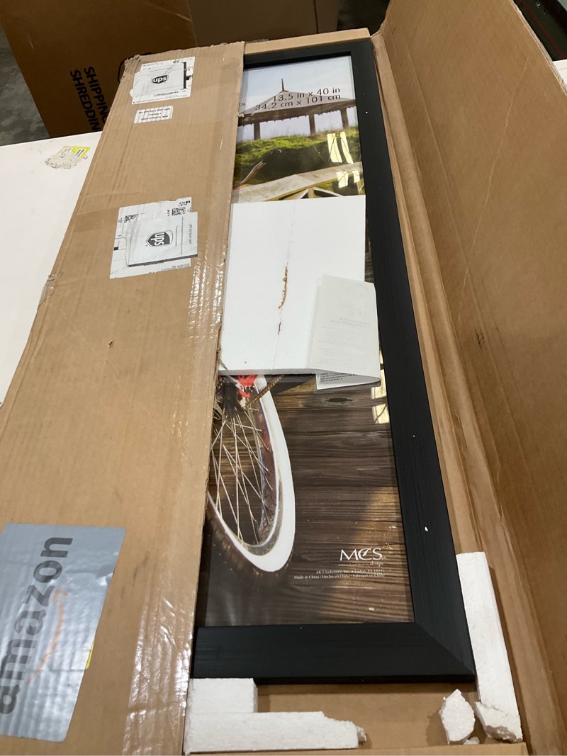 Condition photo showing Good Condition for MCS Museum Poster Frame, Onyx, 13.5 x 40 in, Single Single Onyx Woodgrain 13.5 x 40 in