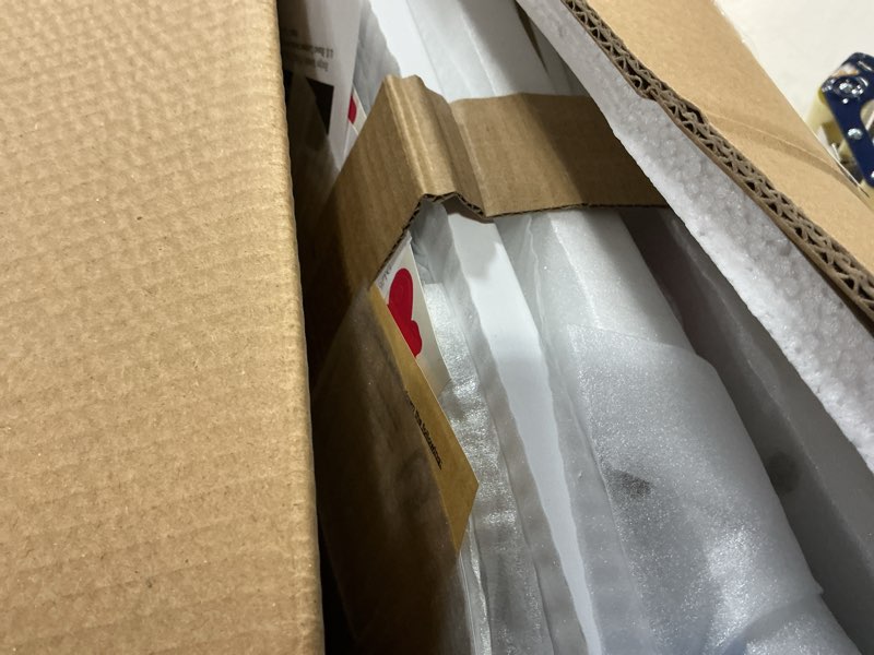 Condition photo showing Good Condition for Badger Basket Wooden Toy Doll Bed with Storage, Mobile, and Bedding - Includes Wheels and Free Personalization Kit to Pretend and Play - White with Pink Chevron Fabric