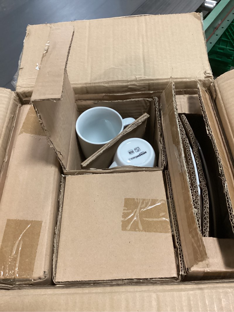 Condition photo showing New/Like New for Amazon Basics 16-Piece Porcelain Kitchen Dinnerware Set with Plates, Bowls and Mugs, Service for 4 - White