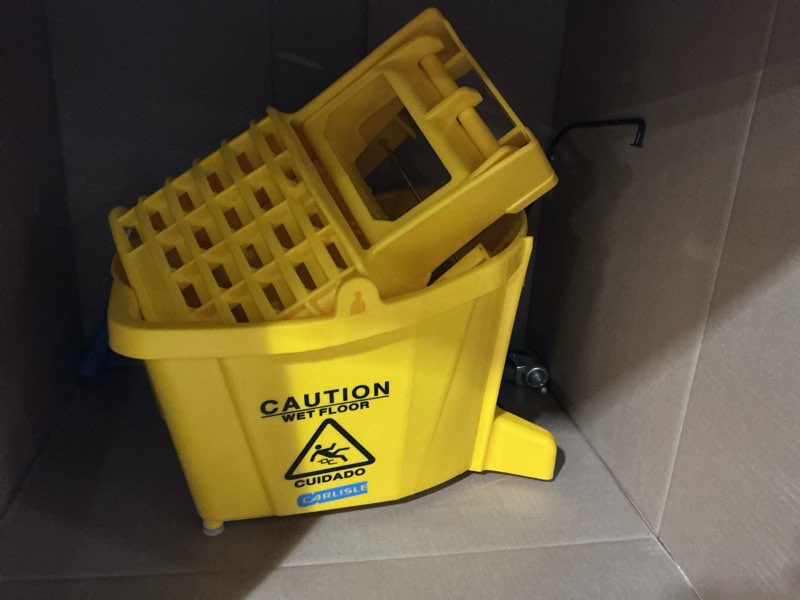 Condition photo showing Good Condition for carlisle foodservice products 26-quart commercial mop bucket with side-press wringer, precision-molded polypropylene, durable wringer, bucket with non-marking casters, 18.5 x 16.5 x 23 inches, yellow