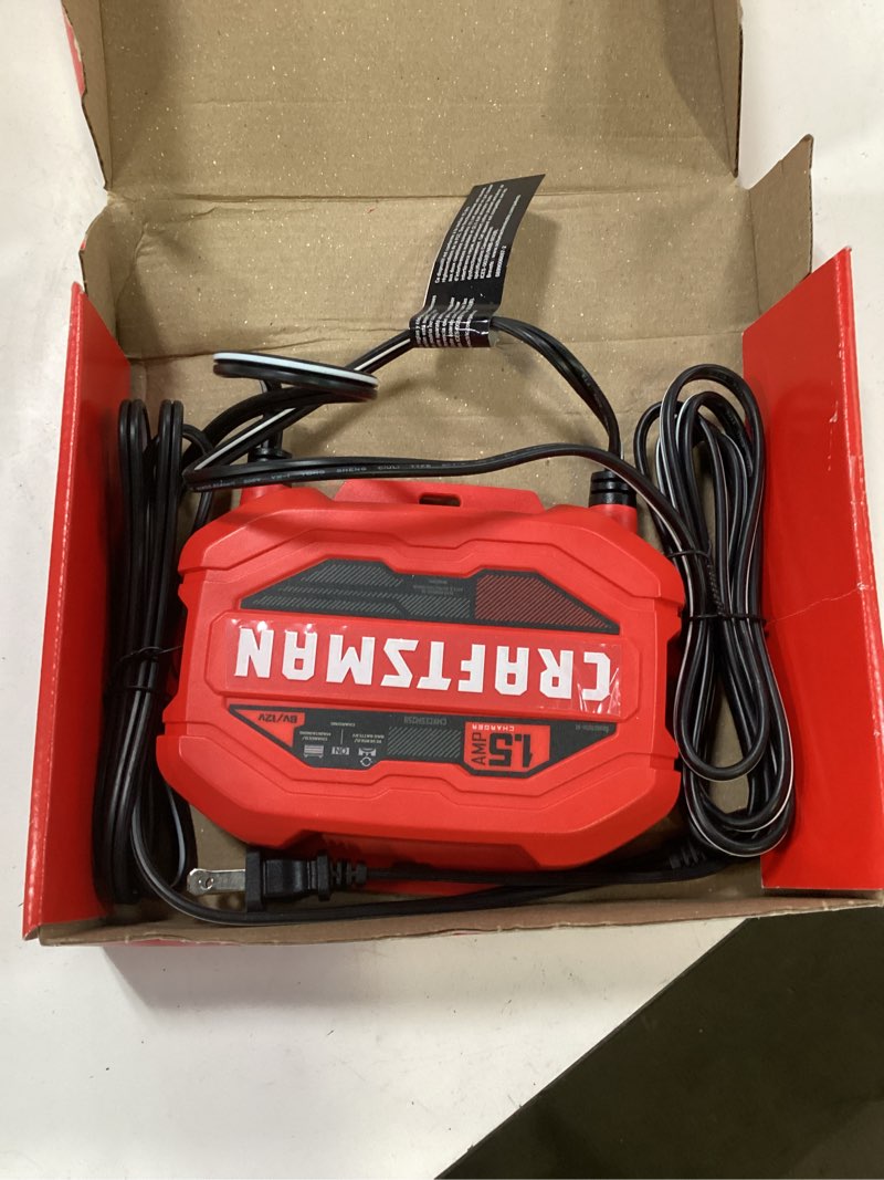 Condition photo showing As Is for craftsman 1.5-amp 6/12-volt car battery charger