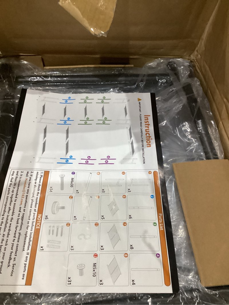 Condition photo showing New/Like New for Wardrobe Closet,Portable Clothes Rack with 4 Tiers Shelves,Freestanding Closet Organizers and Storage System with Hanging Rods,Steel Clothing Rack Suitable for Cloakrooms,Bedrooms,Entrances,etc.Black