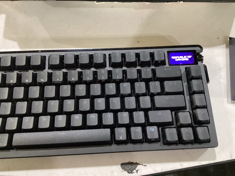 Condition photo showing Good Condition for *only keyboard* asus rog azoth extreme wireless mechanical gaming keyboard – 75% tkl, rog nx snow linear switches, pbt keycaps, aluminum chassis, carbon fiber, gasket mount, color oled screen, pc/mac support - black black snow linear azoth extreme pbt keycap