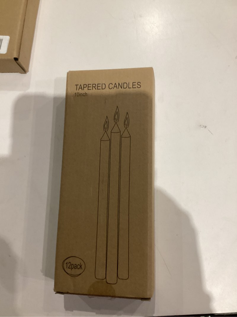 Condition photo showing As Is for Taper Candles, 10 Inch, Ivory, Unscented, Dripless, Set of 12, Illuminate Your Space with Warmth!, Burn Clean, add Cozy ambiance to Any Room! Perfect for Any Home!