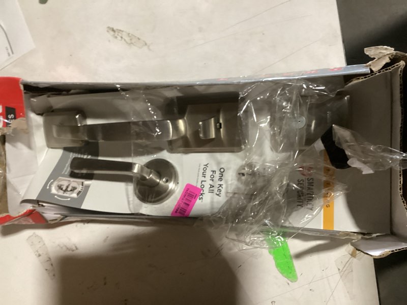 Condition photo showing New/Like New for kwikset brentford front door lock handle and deadbolt set, entry handleset with trafford reversible lever, satin nickel, pick resistant smartkey rekey deadbolt security, with microban protection satin nickel with deadbolt