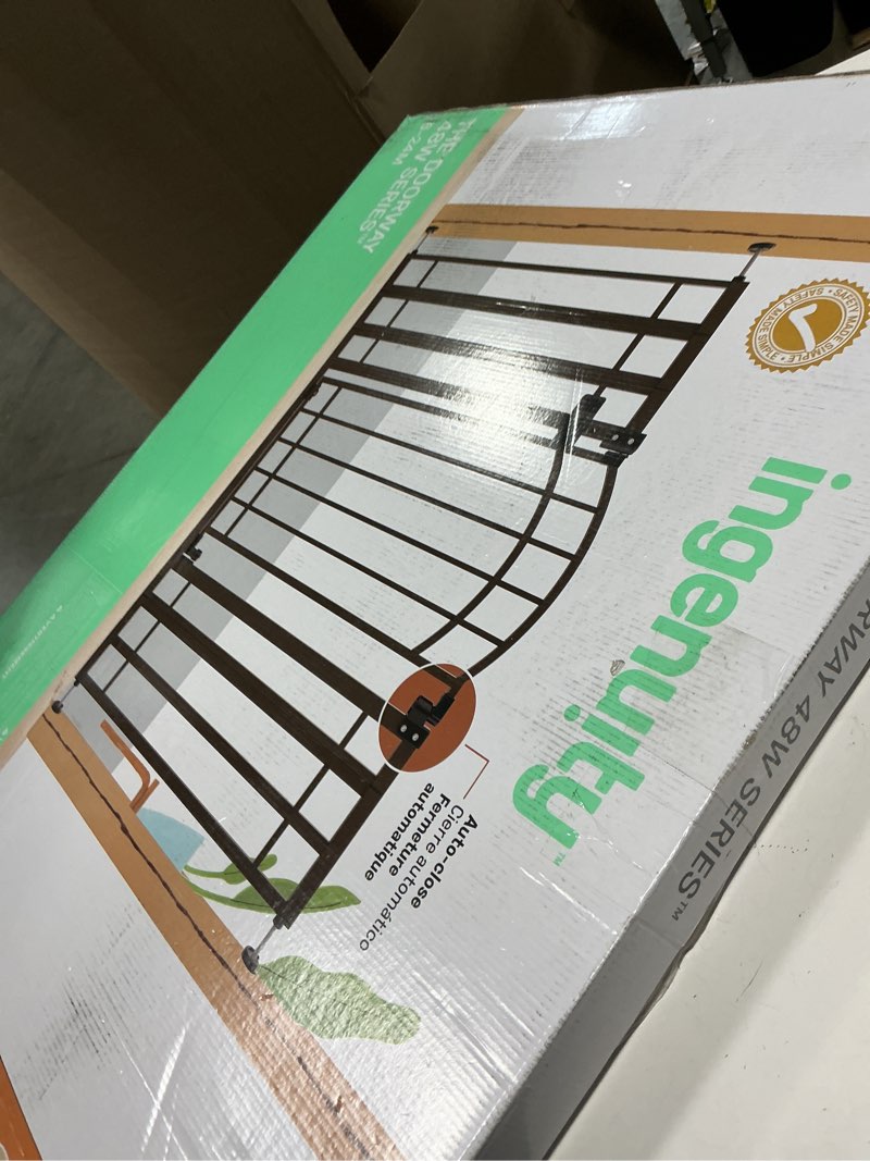 Condition photo showing New/Like New for ingenuity decorative extra tall baby gate & dog gate, 28.5"-48" wide, 36" tall, hardware or pressure mounted, install on top or bottom of stairs, banister, or doorway - bronze