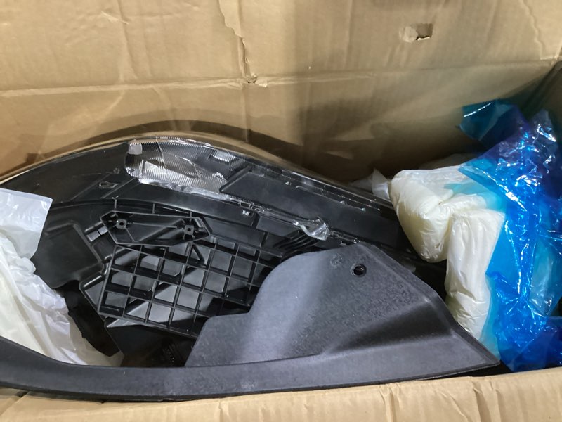 Condition photo showing As Is for ** damages ** right headlight assembly for 2015 2016 2017 hyundai sonata, passenger side halogen headlamp with clear lens black housing amber reflector (with bulb), 1 pc, 92102-c2000 92102c2000 hy2503183