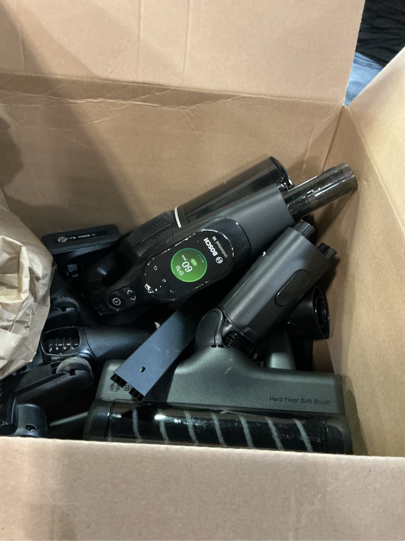 Condition photo showing As Is for bosch unlimited 10 cordless stick vacuum, up to 80-min runtime, 90° flex tube, fast charger, microclean, >99.9% dust pick-up, hepa filter, pet hair, carpets & hard floors, 6 accessories, black