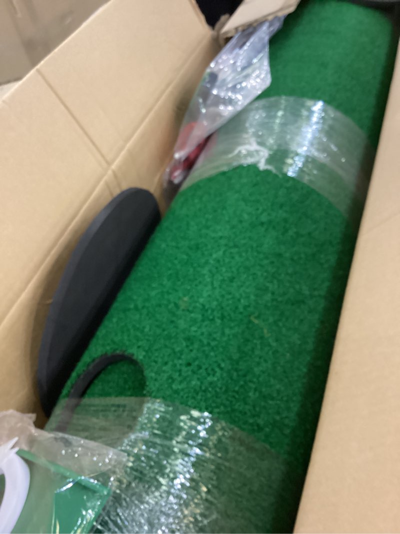 Condition photo showing As Is for Indoor putting green golf