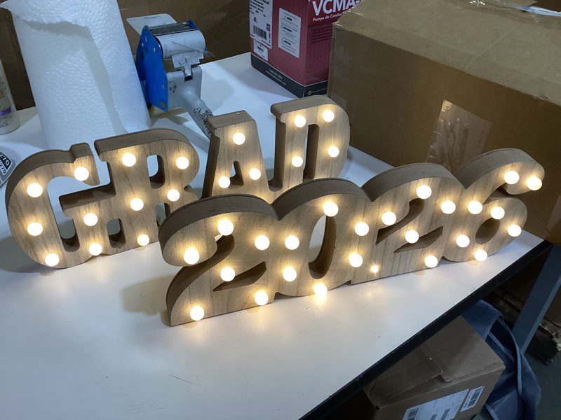 Condition photo showing Good Condition for graduation decorations 2026-2 led long marquee light up letters 'grad 2026' - class of 2026 graduation party decorations sign for kindergarten high school college decor table centerpieces ornaments