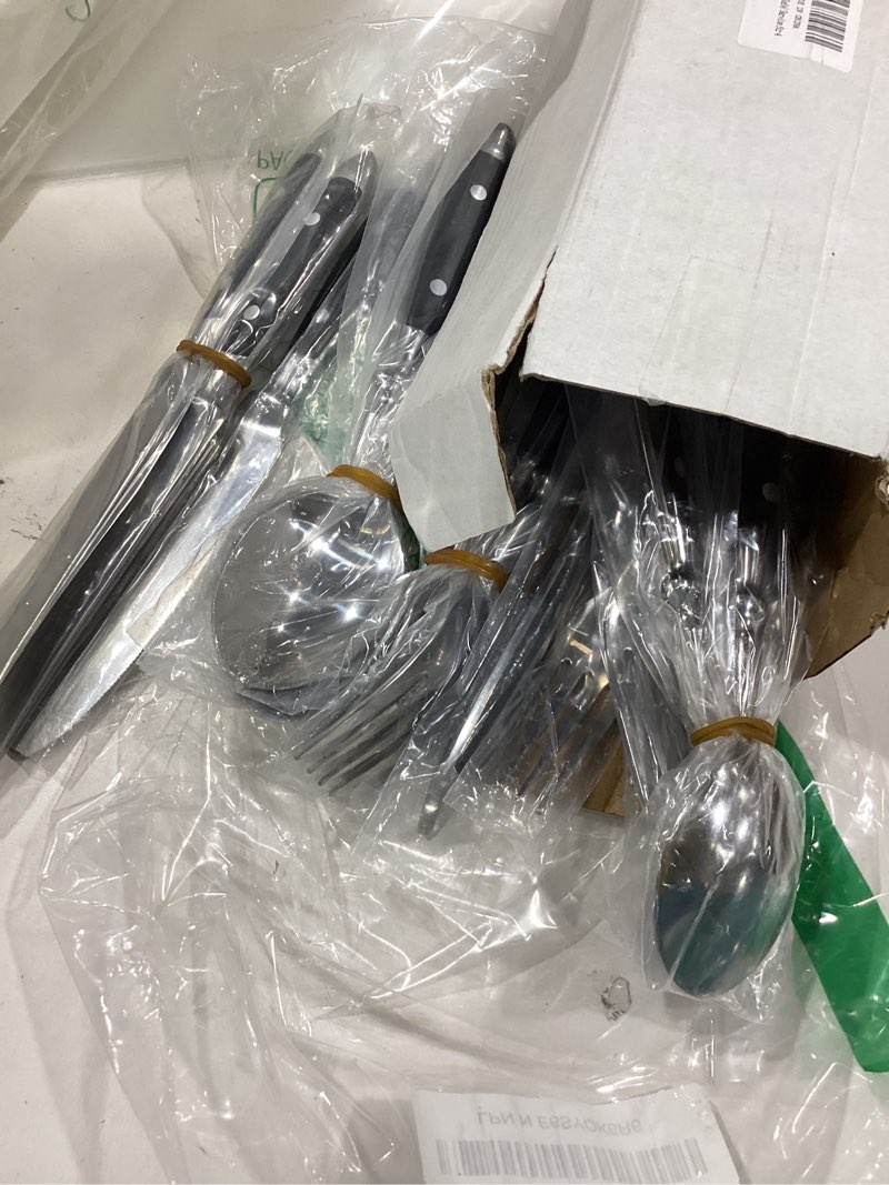 Condition photo showing Good Condition for retro 20-piece silverware set, stainless steel cutlery set, vintage flatware set with black bakelite handle, dishwasher safe| service for 4 black 20 pieces for 4