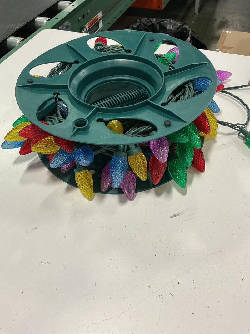Condition photo showing As Is for GE StayBright 150 LED C5 Christmas Holiday Light String Multi Color On Hose Reel