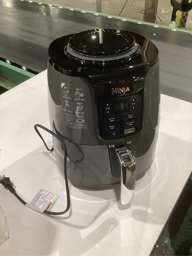 Condition photo showing Good Condition for (not tested)ninja air fryer | 4 qt capacity | 4-in-1 roast, crisp, roast, reheats, & dehydrates | dishwasher safe parts | 105°f-400°f | includes 20 easy & healthy recipes | 1550 watt | grey | af101