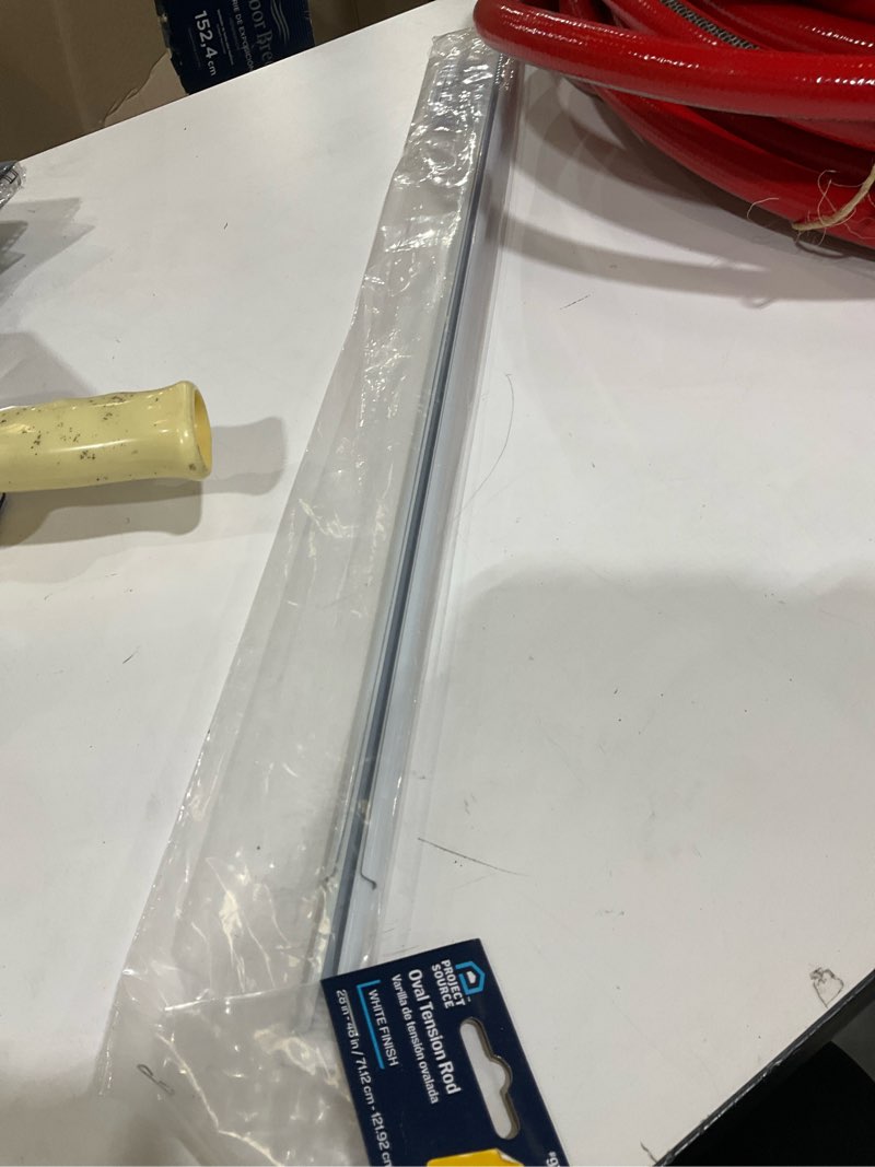 Condition photo showing As Is for project source 28-in to 48-in white steel side tension curtain rod