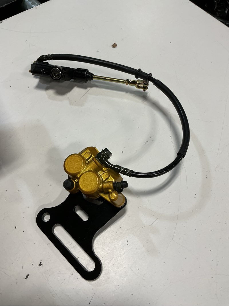 Condition photo showing As Is for rear brake caliper & master cylinder replacement - with spare brake pads - compatible with 70cc, 90cc, 110cc, 125cc, 140cc, 200cc ssr baja chinese dirt pit bikes with 12mm wheel shaft