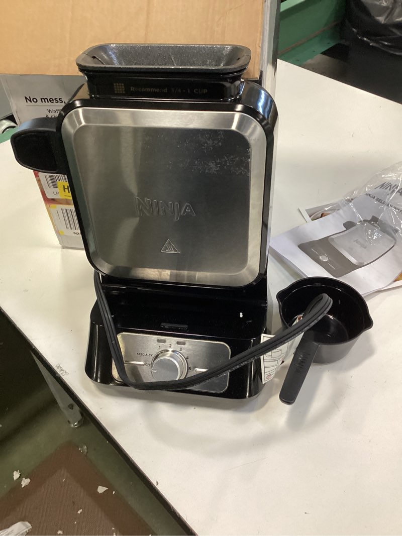 Condition photo showing As Is for Ninja BW1001 NeverStick PRO Belgian Waffle Maker, Vertical Design, 5 Shade Settings, with Precision-Pour Cup & Chef-curated Recipe Guide, Black & Silver