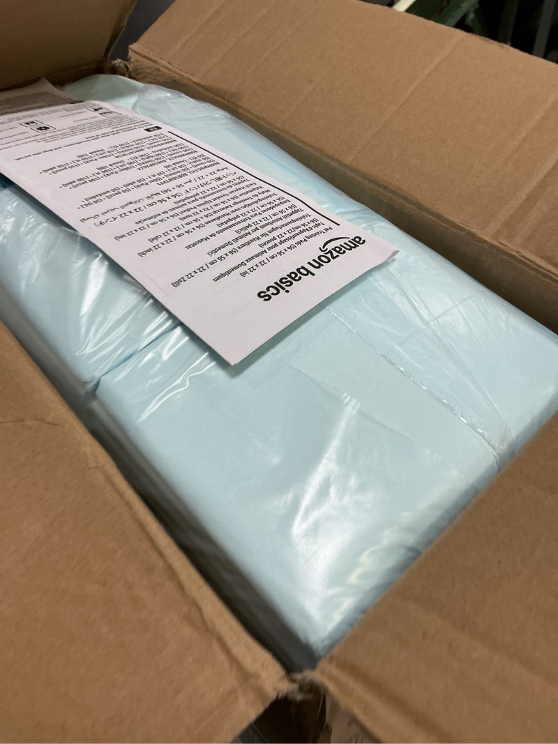 Condition photo showing Good Condition for amazon basics dog and puppy pee pads, 5-layer leak-proof super absorbent, quick-dry surface, potty training, regular (22x22"), 150 count, blue & white regular (150 count)