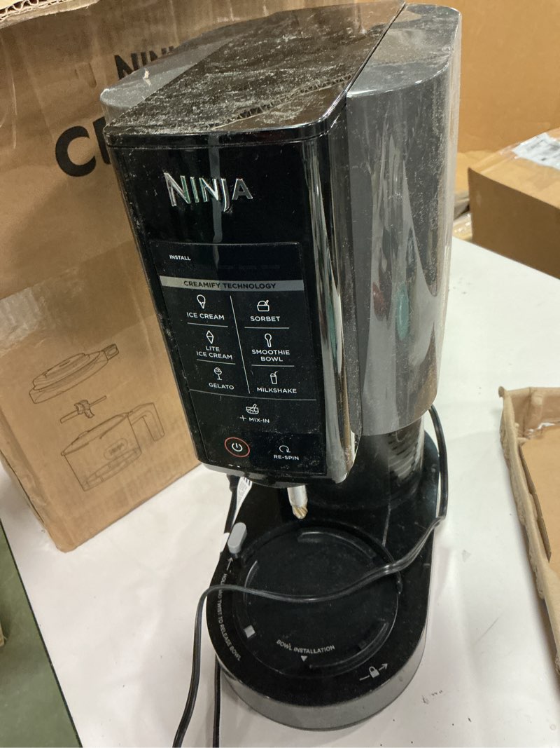 Condition photo showing As Is for Ninja CREAMi, Ice Cream Maker, Ice Cream, Gelato, Sorbet,Milkshakes, Mix-ins, Smoothie Bowls & More, 7-in-1, Ice Cream Pints, Pint lid, Healthy Ice Cream, Compact, Perfect for Kids, Black, NC299AMZ Ninja CREAMi 7-in-1