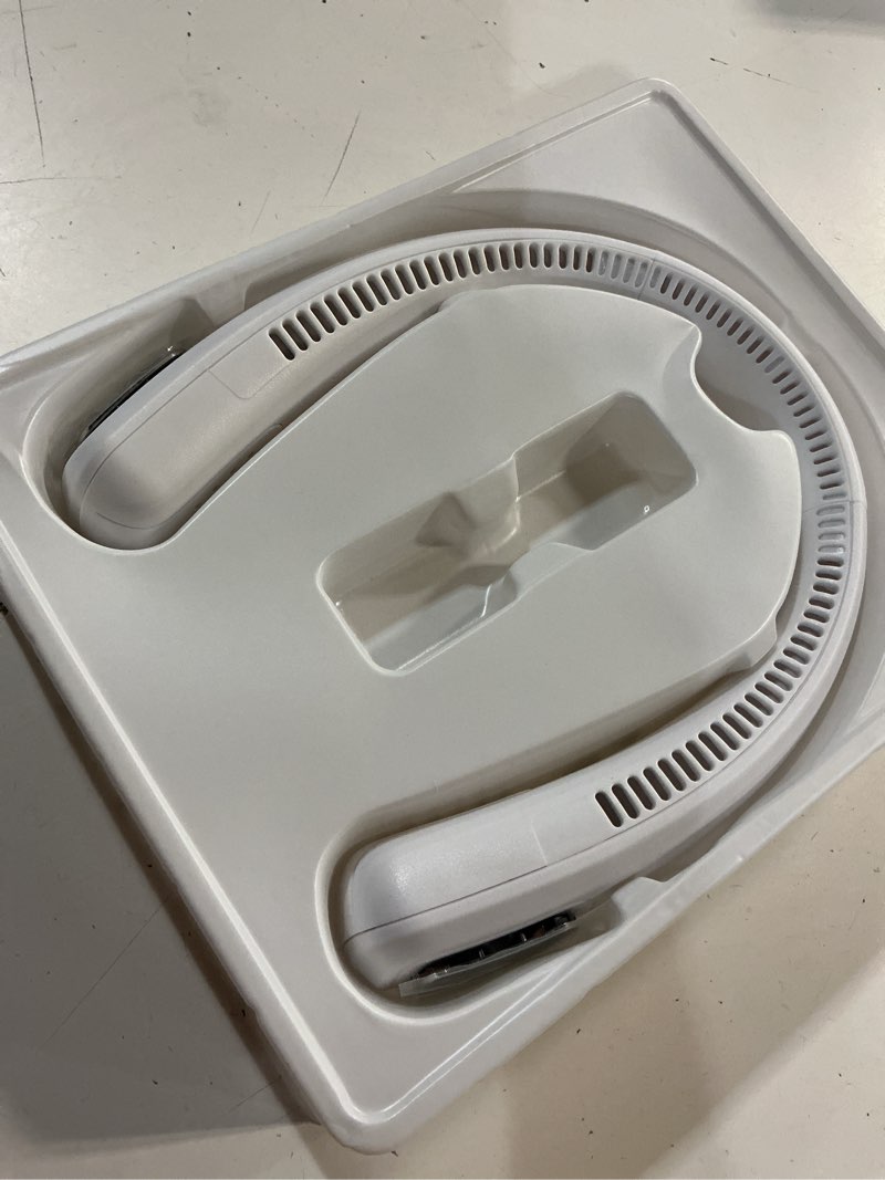 Condition photo showing As Is for arctic air freedom neck cooler, portable neck fan with 3 fan speeds, usb charging, 6-hour battery