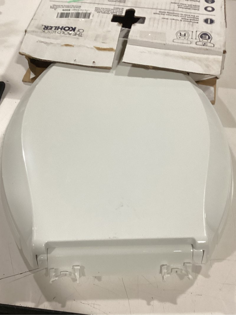 Condition photo showing As Is for kohler 4636-rl-0 cachet readylatch elongated slow close toilet seat, soft close toilet seat quiet lid, contoured grip-tight bumpers installation hardware, apartment essentials, white white elongated ready latch