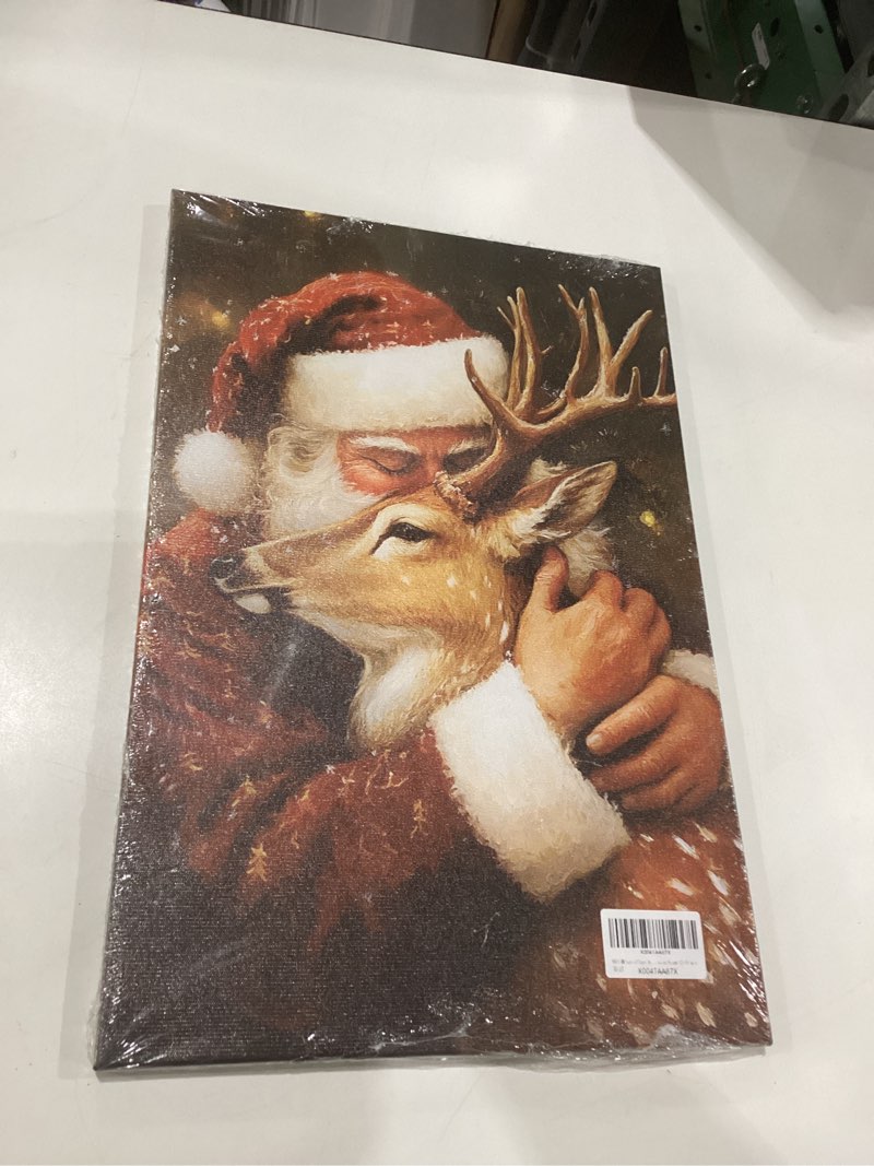 Condition photo showing New/Like New for NTEUMM Santa Claus Hug Reindeer Canvas Poster Santa Canvas Wall Art Santa Claus Pictures of Christmas Santa Christmas Gift Wall Hanging Decor Wooden Frame 12x18 inch Color3-Framed 18"L x 12"W