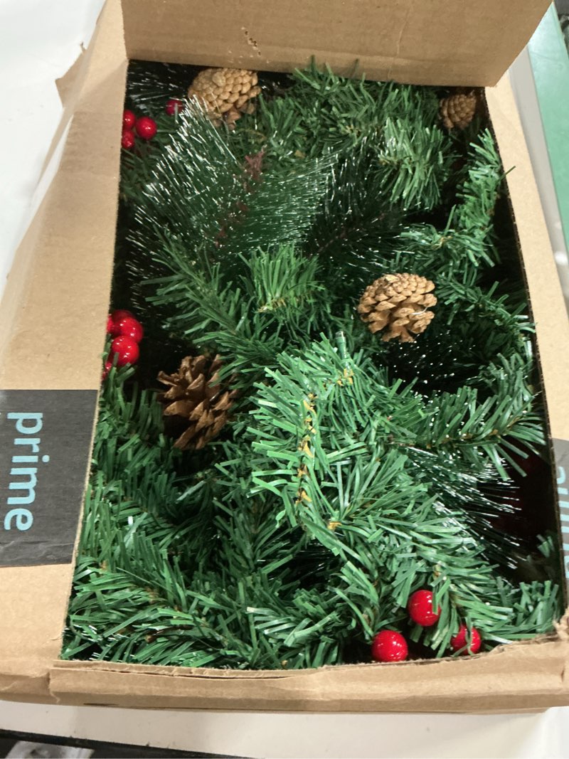 Condition photo showing item condition for Christmas Garland with Lights, 9ft 30LED Battery Operated Garland Decorated with Pine Cones, Berry, Artificial Snowy Pine, Indoor & Outdoor Xmas Garland for Stairs Fireplace Door Fences 1