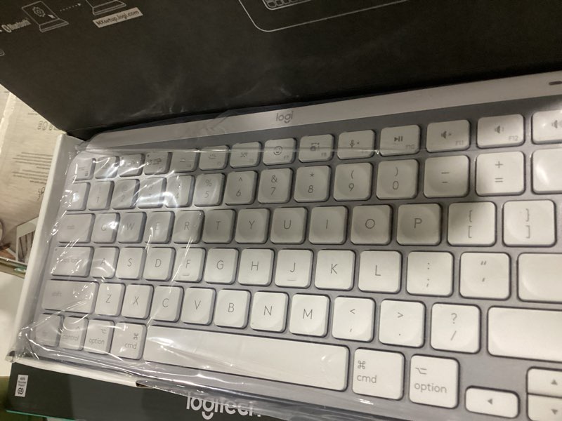 Condition photo showing As Is for Logitech MX Keys Mini for Mac Minimalist Wireless Keyboard, Compact, Bluetooth, Backlit Keys, USB-C, Tactile Typing, Compatible with MacBook Pro,MacBook Air,iMac,iPad - Pale Grey Keyboard Compact Pale Grey