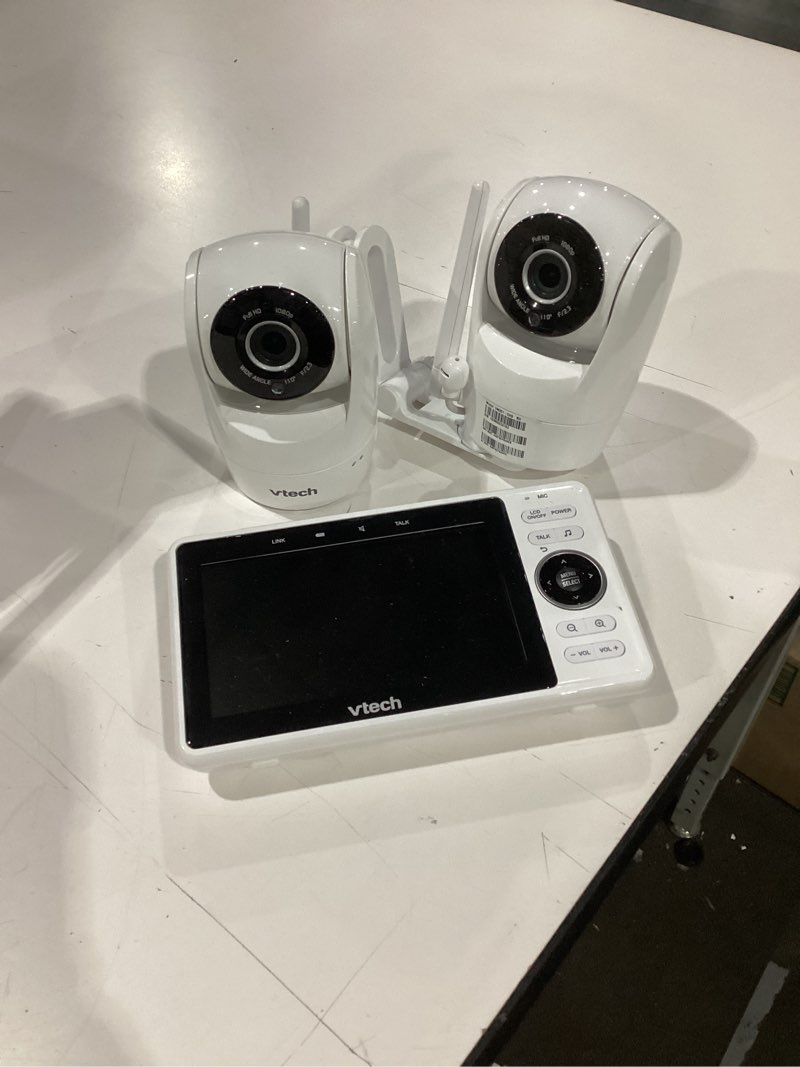 Condition photo showing As Is for used not tested missing parts vtech 2-cameras smart wifi baby monitor with 1080p fhd camera and 5\" hd ips screen, free app with motion video, sound/motion detection and notifications, split-screen, pan-tilt-zoom: vm901-2hd