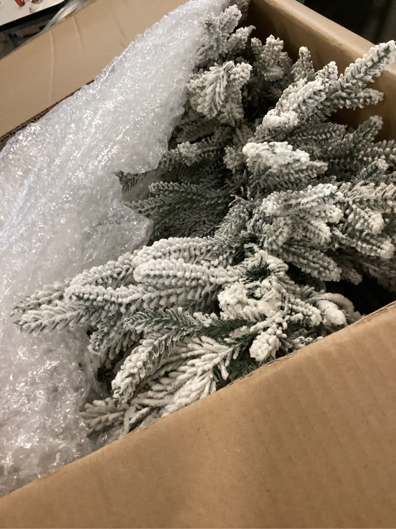 Condition photo showing Good Condition for Puleo International 6ft Pre-Lit Potted Flocked Arctic Fir Pencil Christmas Tree with 120 Warm White Lights, 1325 Realistic Dense Snow Flocked Branch Tips, Easy Setup Artificial Trees with Sturdy Stand 6' Flocked Arctic Fir 120 Clear Lights