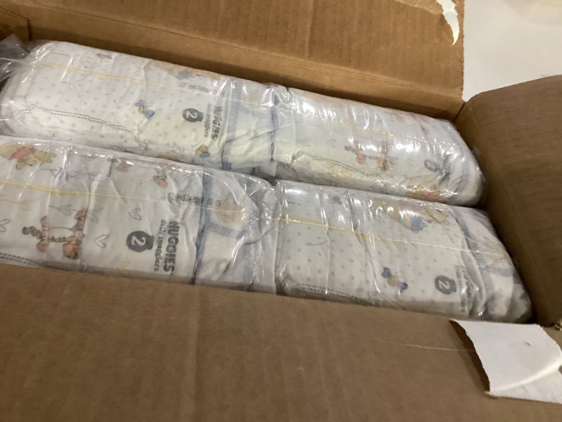 Condition photo showing New/Like New for huggies size 2 diapers, little snugglers baby diapers, size 2 (12-18 lbs), 148 count, packaging may vary size 2 148