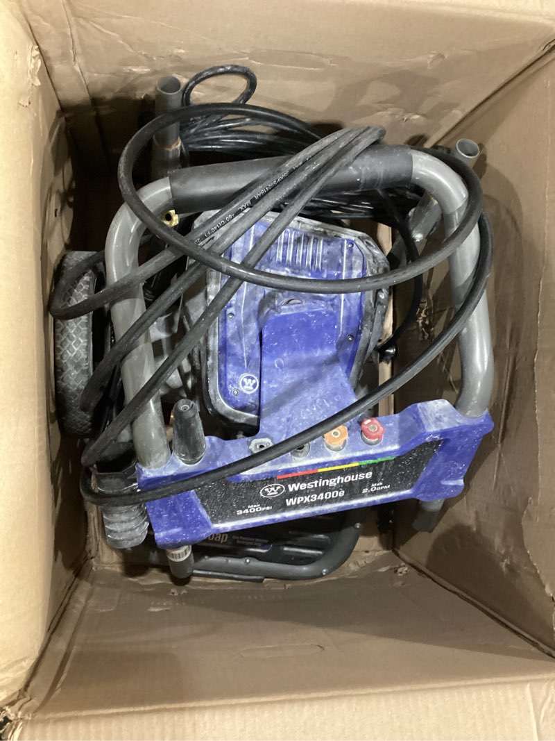 Condition photo showing As Is for USED NOT TESTED MISSING ONE TIP Westinghouse WPX3400e Electric Pressure Washer, 3400 Max PSI and 2.0 Max GPM, Brushless Motor, Onboard Soap Tank, Spray Gun and Wand, 5 Nozzle Set, for Cars/Fences/Driveways/Homes/Patios/Furniture