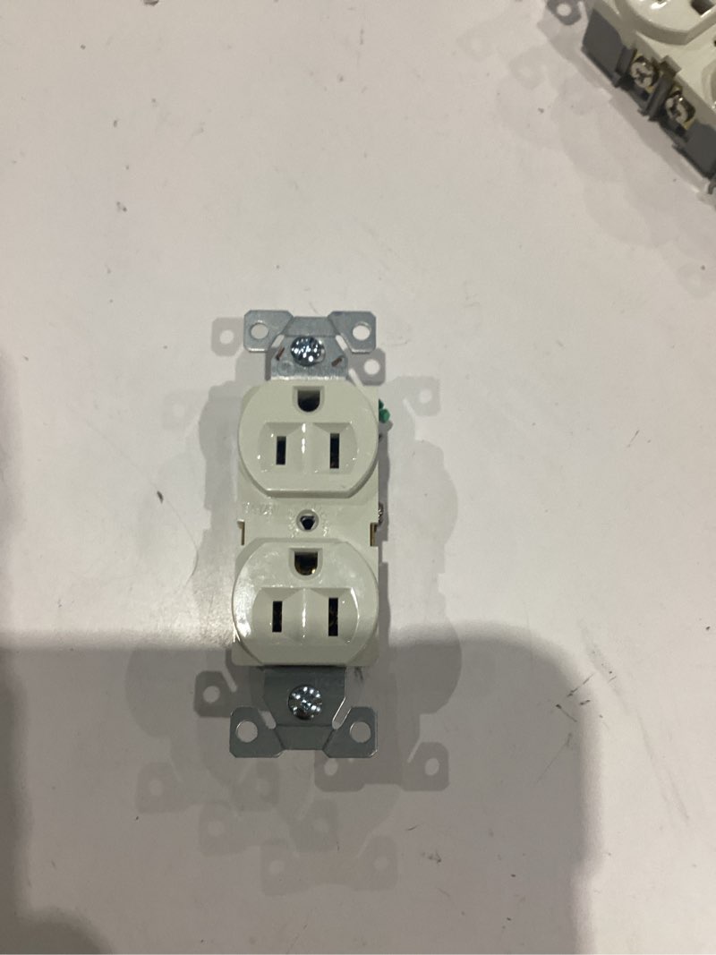 Condition photo showing As Is for eaton 15 -amp 125-volt commercial duplex outlet receptacles , light almond